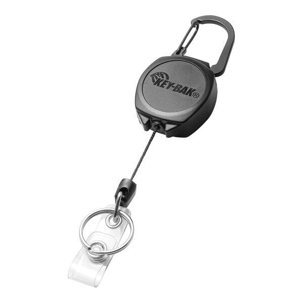 A close-up of a black KEY-BAK Sidekick retractable lanyard with a key ring.