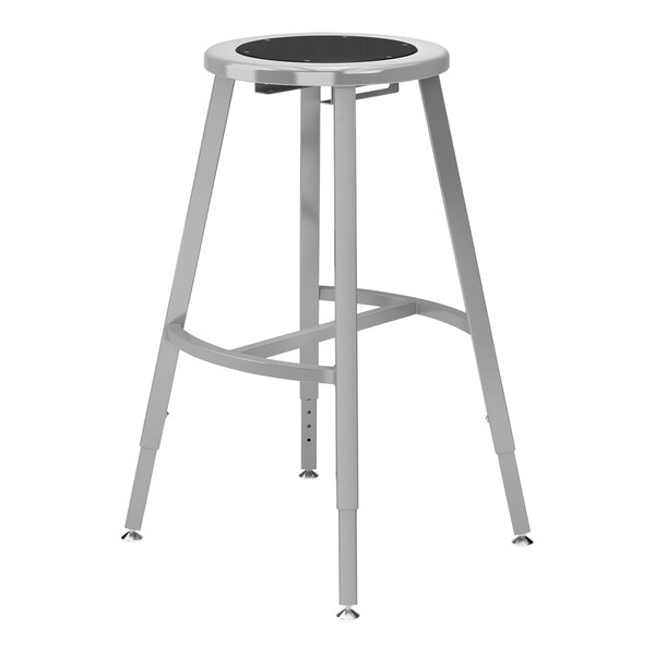 A National Public Seating Titan lab stool with a black round seat and metal legs.