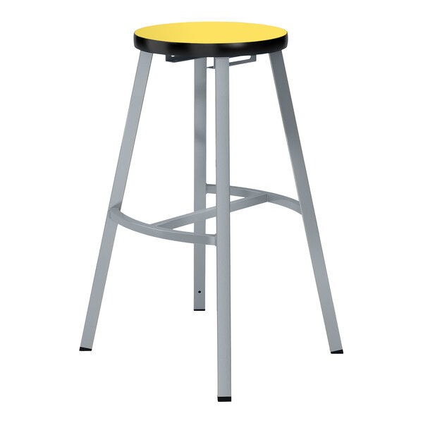 A National Public Seating Titan lab stool with a marigold high-pressure laminate seat and gray steel legs.