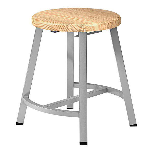 A National Public Seating Titan lab stool with a round wooden seat and metal legs.