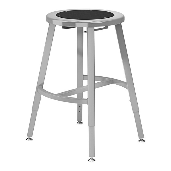 A National Public Seating Titan lab stool with a black round seat and metal legs.