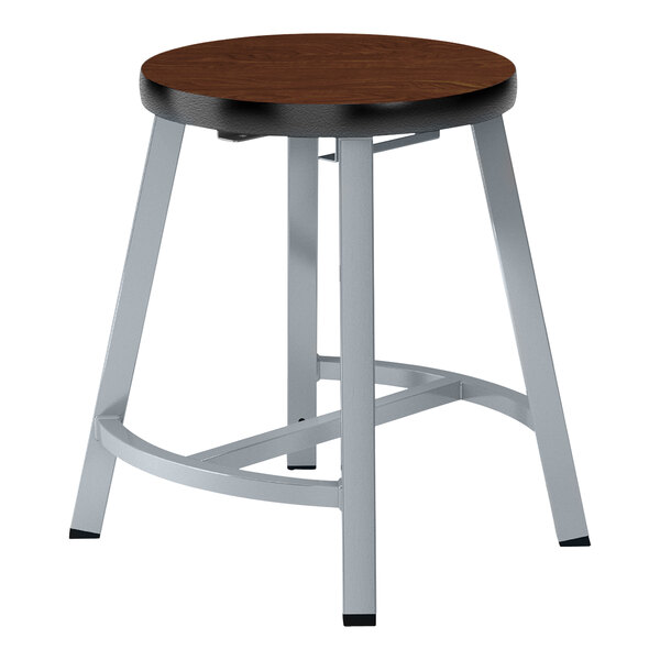 A National Public Seating Titan lab stool with a round wooden seat and metal legs.