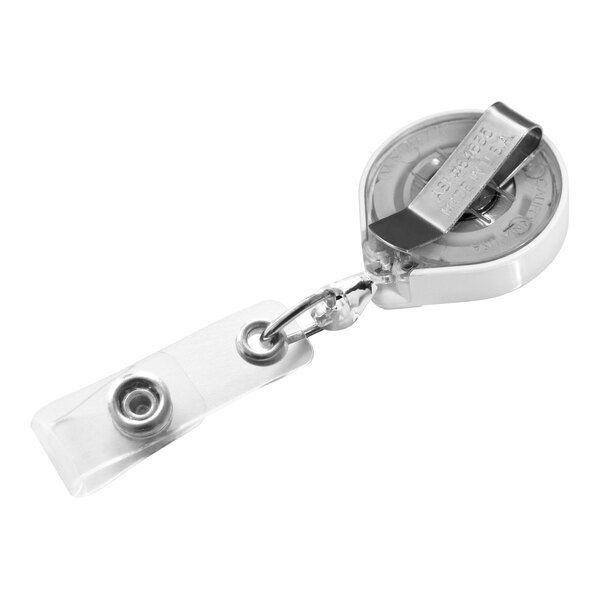 A white KEY-BAK Mini-BAK retractable badge holder with a metal clip.