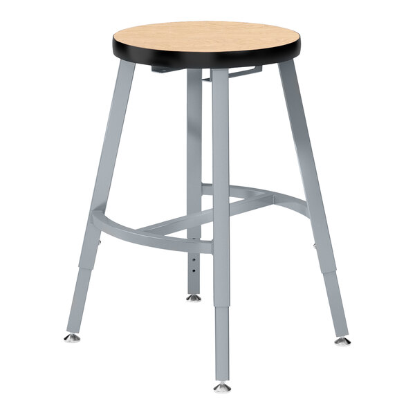 A National Public Seating Titan lab stool with a fusion maple seat and metal legs.
