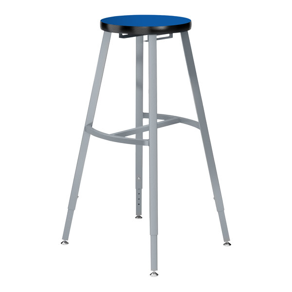 A National Public Seating lab stool with a Persian Blue seat and metal legs.