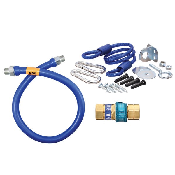 A blue Dormont gas connector hose kit with restraining cable and parts.