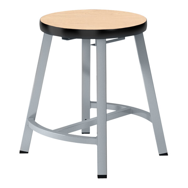 A National Public Seating Titan lab stool with a round wooden seat and metal legs.