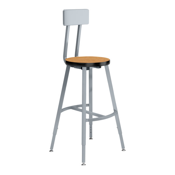 A National Public Seating lab stool with a steel frame and Bannister Oak seat and backrest.