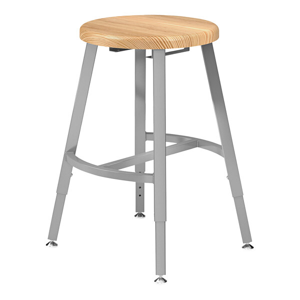 A National Public Seating Titan lab stool with a wooden seat and steel legs.