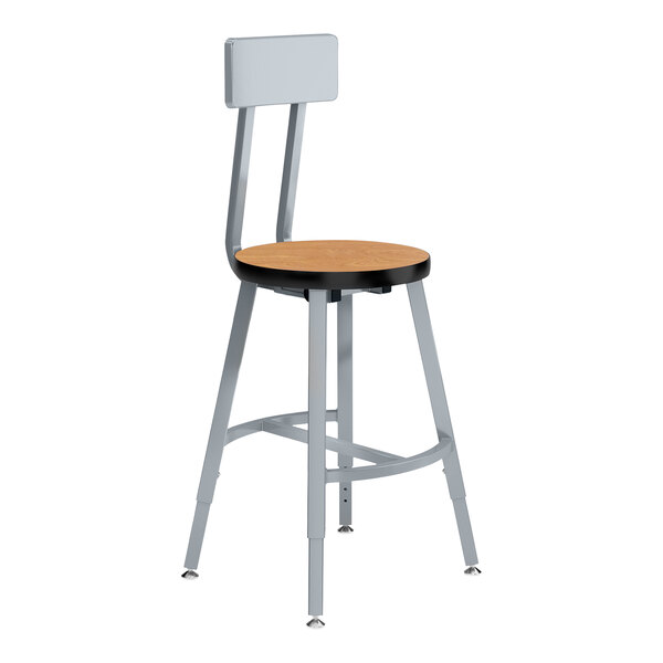 A National Public Seating lab stool with a Bannister Oak seat and backrest and a metal frame.