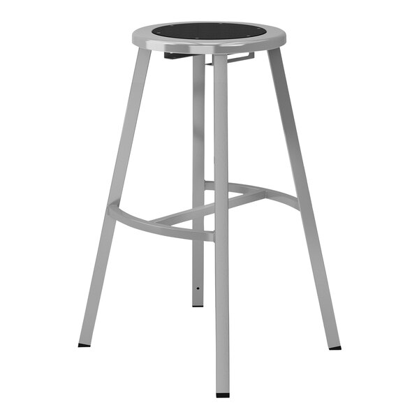 A National Public Seating Titan steel lab stool with a black seat.