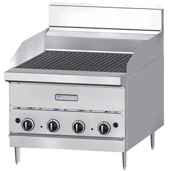 A close-up of the Garland 30-inch ceramic briquette charbroiler.