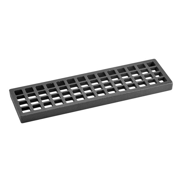 A black rectangular cast iron bottom grate with holes.