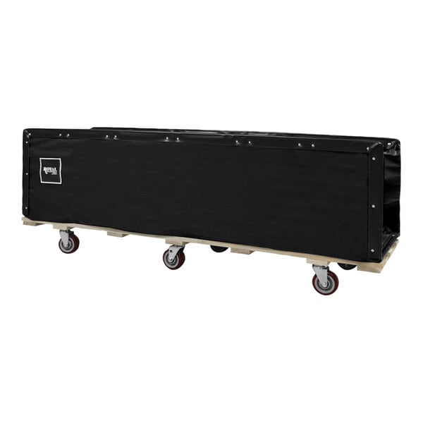 A black plastic container on a wooden cart with wheels.