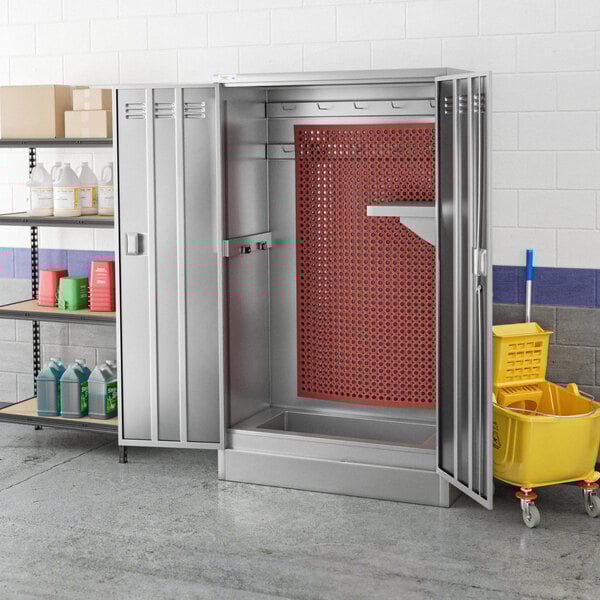 A Regency stainless steel mop sink cabinet with mat holders.