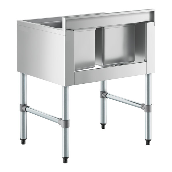A Regency stainless steel underbar sink with two compartments on a stand.