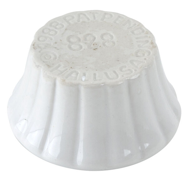 A white Hall China flared ramekin with a number on it.