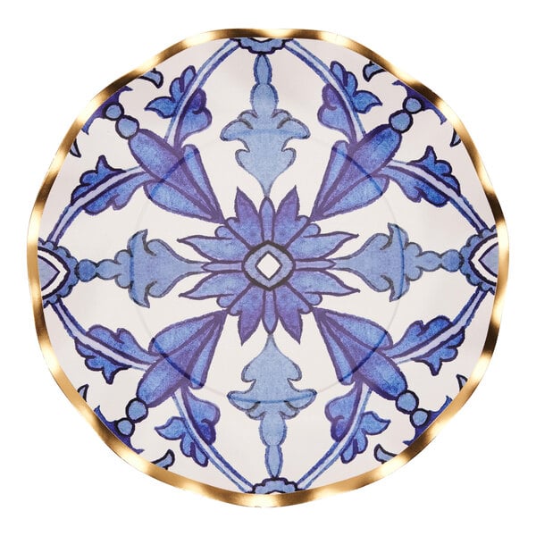 A Sophistiplate paper salad plate with a blue and white Moroccan design and gold rim.