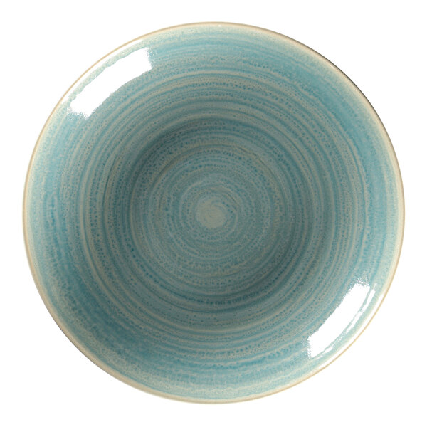 A close-up of a RAK Porcelain Sapphire deep coupe plate with a blue and white swirl pattern.