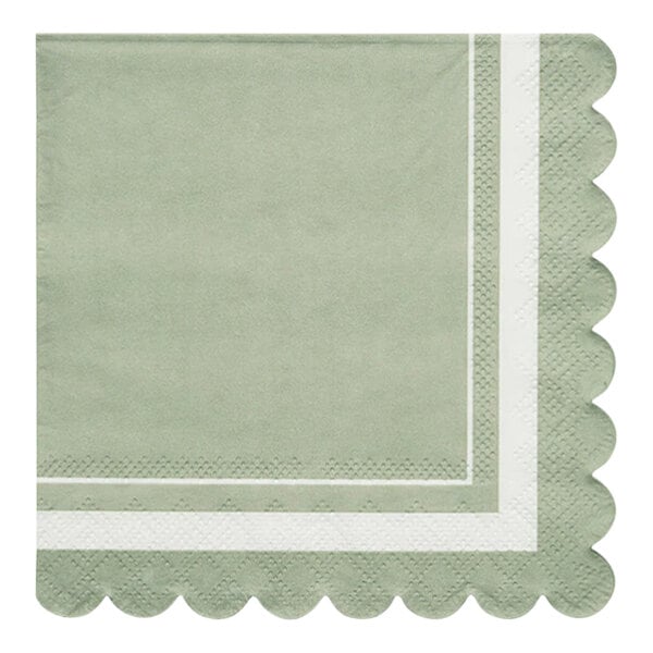 A green Sophistiplate paper cocktail napkin with a white scalloped edge.