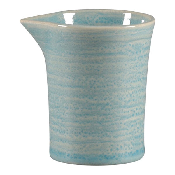 A blue and white RAK Porcelain creamer with a white rim.