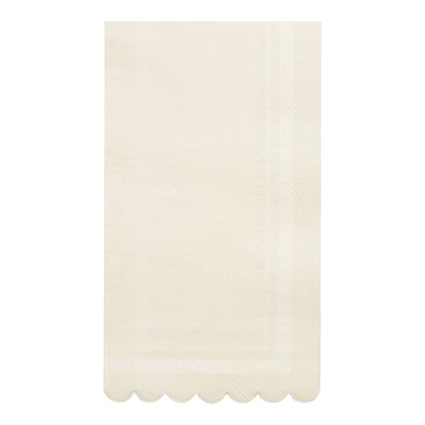 A white Sophistiplate paper guest towel with scalloped edges.