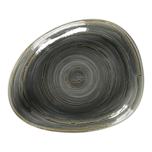 A grey Rakstone porcelain plate with a brown spiral pattern.