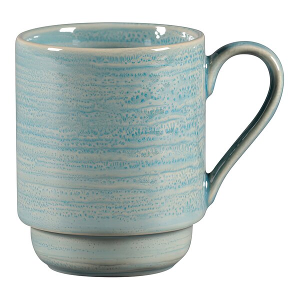 A blue RAK Porcelain mug with a handle.