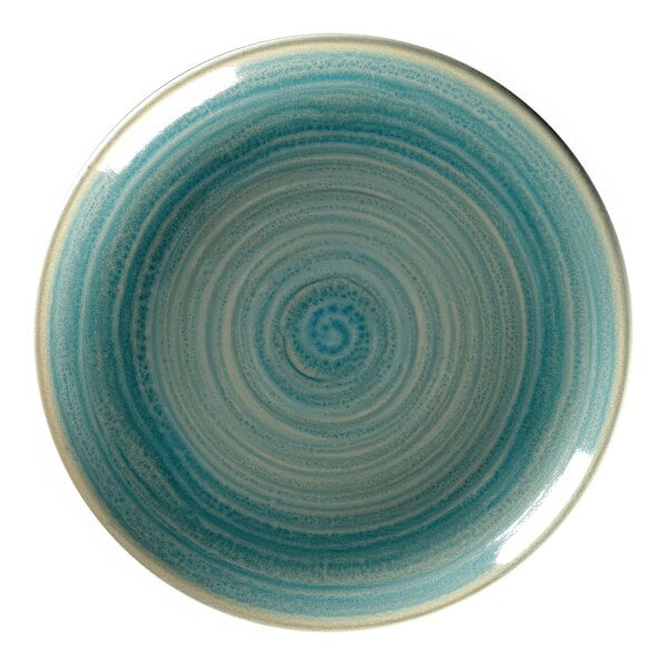 A blue and white porcelain plate with a swirly circle design.