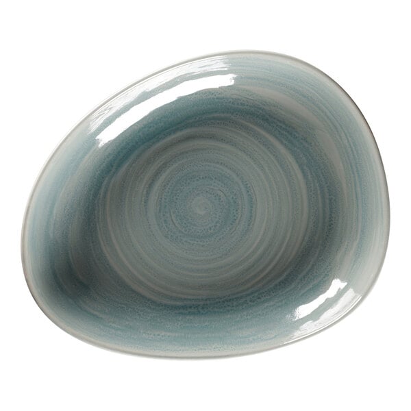 A close-up of a RAK Porcelain blue and white swirl pattern on a plate.
