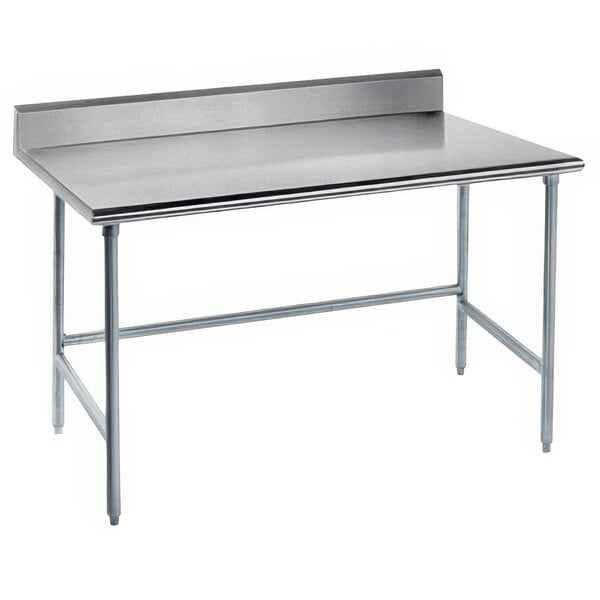 A stainless steel Advance Tabco work table with an open base.