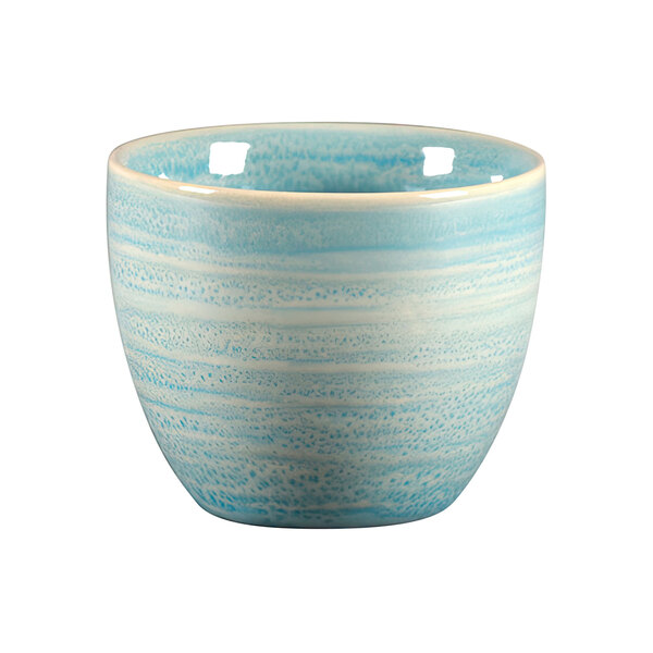 A white porcelain cup with blue and white stripes.