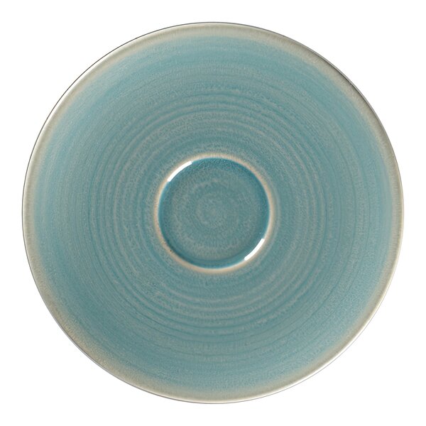 A blue Rakstone porcelain saucer with a circular pattern in the middle.