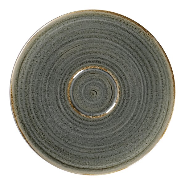 A grey porcelain saucer with a gold and grey circle design.