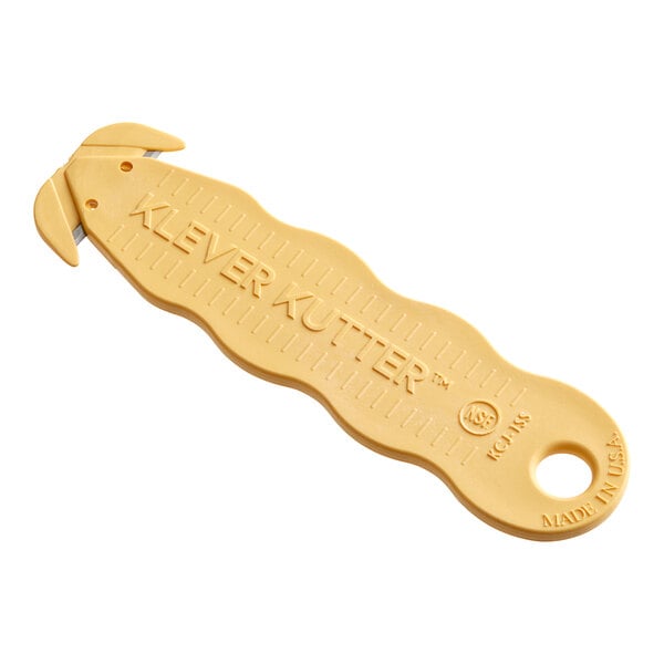 A yellow plastic Klever Kutter with text.