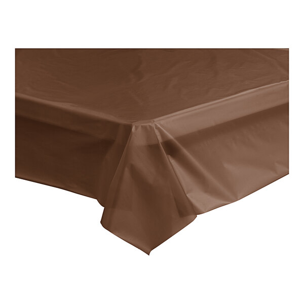 A brown plastic Choice tablecloth roll on a table.