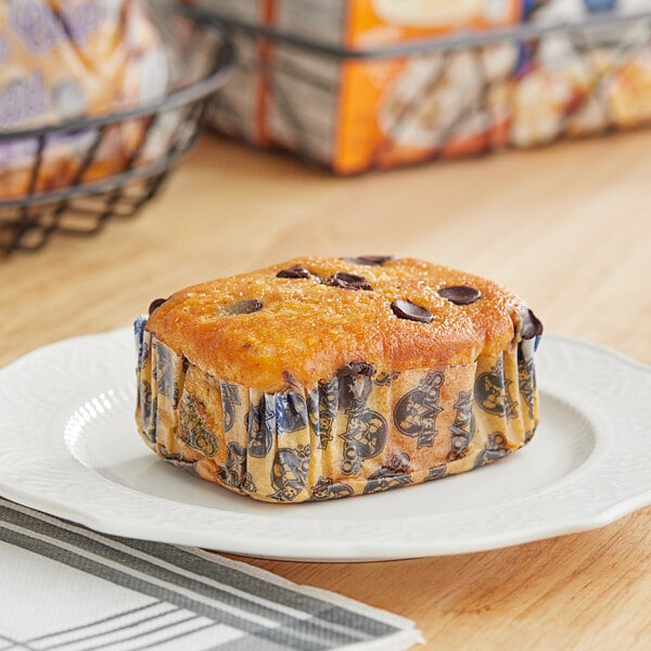 A Ne-Mo's Bakery chocolate chip cake bread loaf on a table.