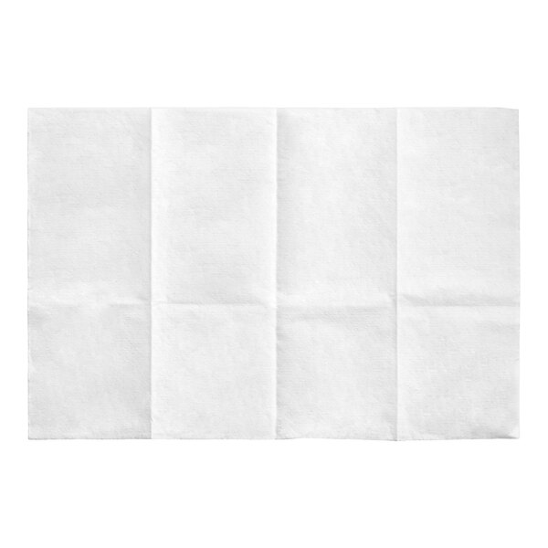 A folded white WypAll paper towel.