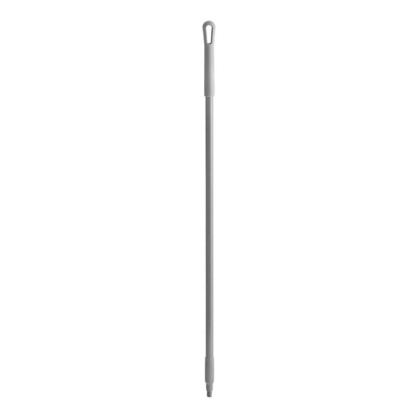 A gray threaded fiberglass pole with a handle on it.