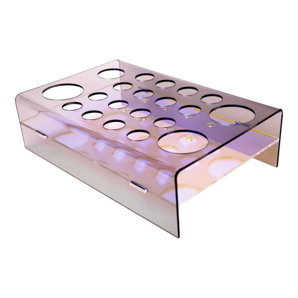 A clear plastic holder with holes in it.