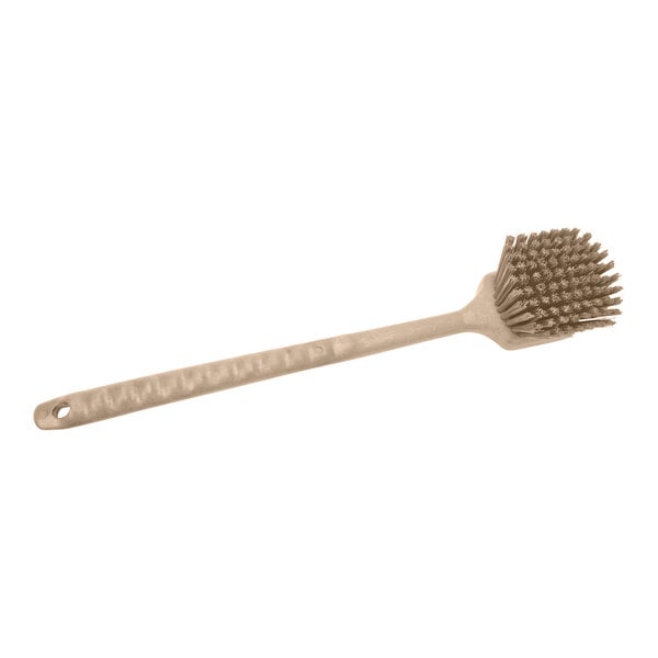 A Carlisle Sparta tan pot scrub brush with a handle and bristles.