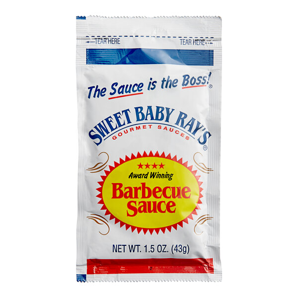 A small white packet of Sweet Baby Ray's Original BBQ Sauce with red and yellow text.