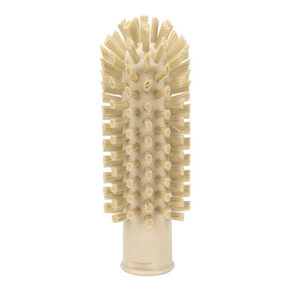 A Carlisle tan pipe and valve brush with a long handle.
