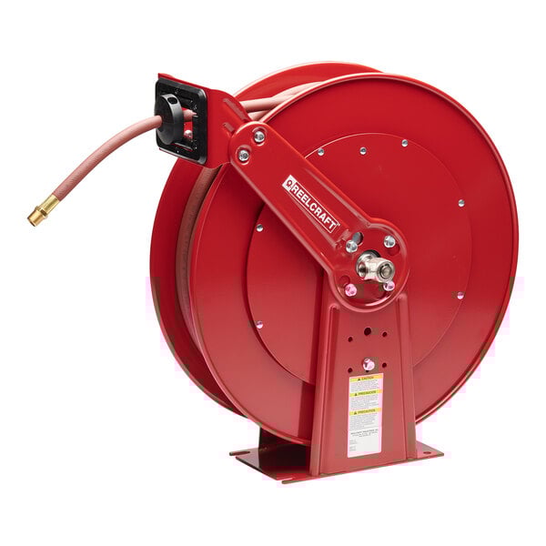 A red Reelcraft hose reel with a hose attached.