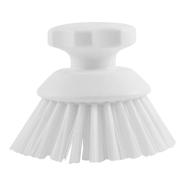 A white round Carlisle Sparta palm scrub brush with bristles.