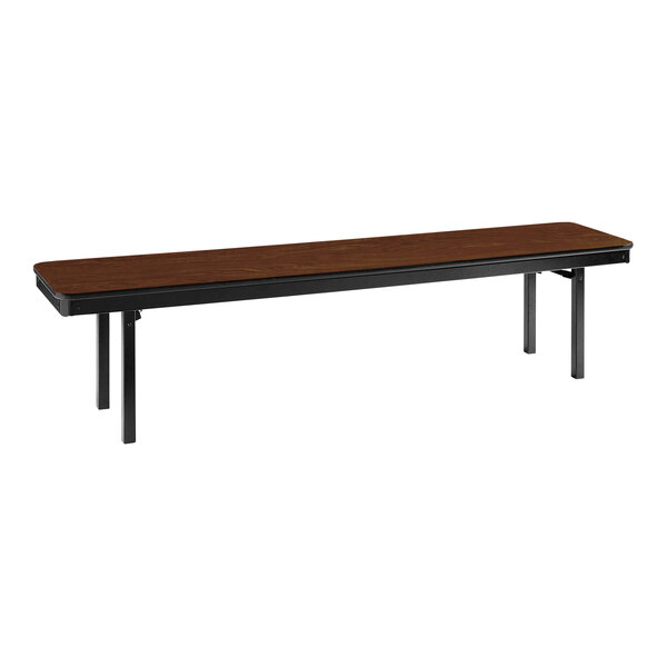 A National Public Seating Montana Walnut MDF folding bench with black legs.