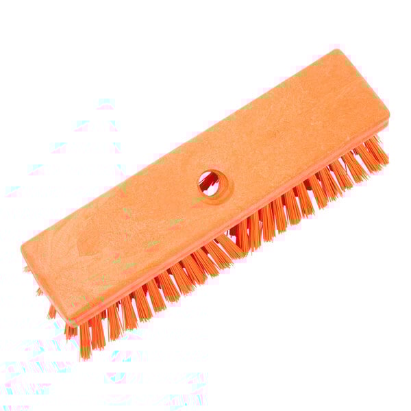 An orange Carlisle Sparta plastic deck scrub brush.