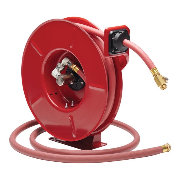 A red Reelcraft garden hose reel with a hose attached to it.