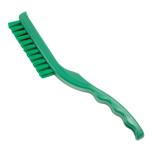 A close-up of the green Carlisle Sparta narrow detail brush with a handle.