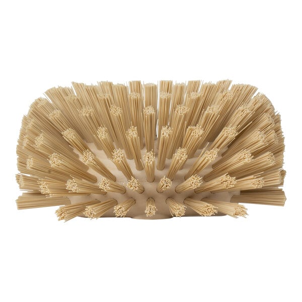 A round tan Carlisle brush with long bristles.